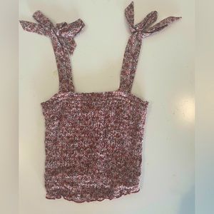 flower crop top with tie shoulders. pink ,blue, green, white and black